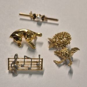 Gold and Silver Brooch Set